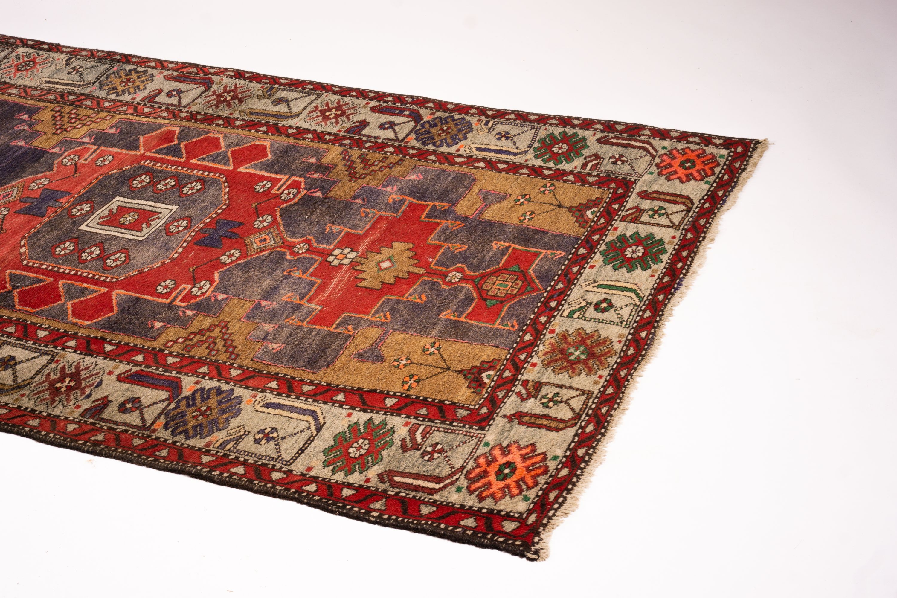 A Caucasian Kazak blue ground rug, 206 x 128cm